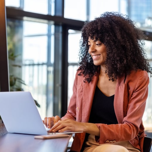 Woman looking at her laptop